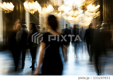 Abstract View of People Walking in a Busy Indoor Space with Soft Focus and Warm Light Effect Abstract View of People Walking in a Busy Indoor Space with Soft Focus and Warm Light Effect 133297651