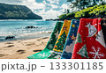 Christmas-themed beach towels, ocean view, festive colors . 133301185