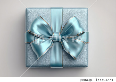 Luxury packaging. Blue box wrapped with a bow on white background. Jewelry, birthdays, Christmas and luxury branding. 133303274