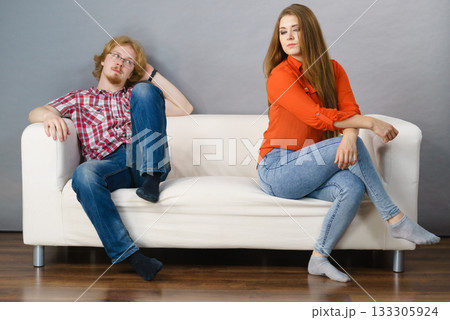 Woman and man after argue on sofa Woman and man after argue on sofa 133305924