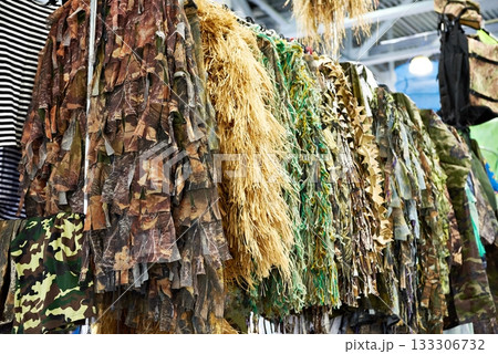 Camouflage clothing for hunters in shop Camouflage clothing for hunters in shop 133306732