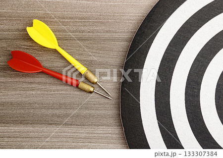 Darts and Target A Game of Precision, target accuracy concept, perfect accuracy. Darts and Target A Game of Precision, target accuracy concept, perfect accuracy. 133307384