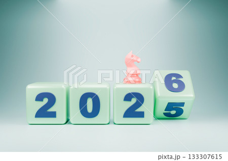 The wooden blocks display the year 2025-2026, with a small chess piece The wooden blocks display the year 2025-2026, with a small chess piece 133307615