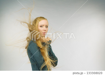 Sad girl with blowing hair Sad girl with blowing hair 133308020