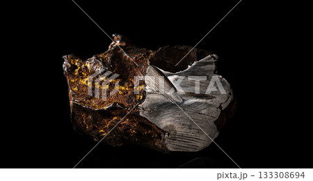 Chondrite Meteorite L Type isolated, piece of rock formed in outer space in the early stages of Solar System as asteroids. This meteorite comes from a meteorite fall impacting Earth 133308694
