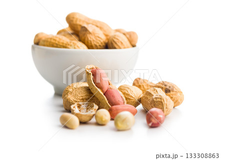 Peanuts in shell. Groundnuts isolated on white background. Peanuts in shell. Groundnuts isolated on white background. 133308863