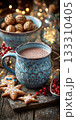 Cozy Holiday Scene with Hot Cocoa, Cookies, and Decorations on the Table 133310405