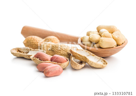 Peanuts in shell. Groundnuts in scoop isolated on white background. Peanuts in shell. Groundnuts in scoop isolated on white background. 133310781