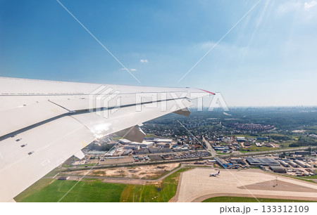 View from the airplane window during takeoff at Sheremetyevo airport at summer 133312109