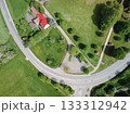 The roundabout road aerial view that newly developed. Summer sunny day. Roundabout on suburban road. 133312942