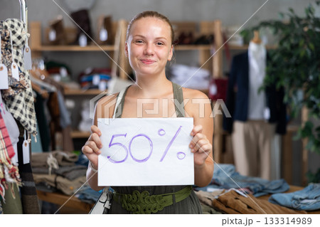 Woman with a sign 50 discount Woman with a sign 50 discount 133314989