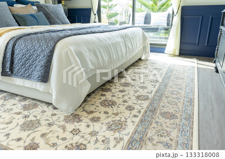 Traditional Arabic woven rug in beautiful bedroom. 133318008