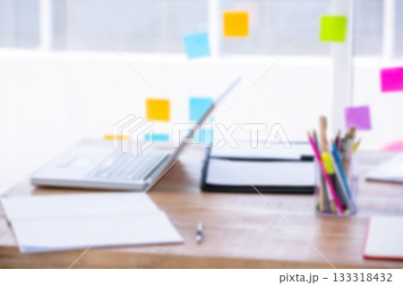 Laptop computer with office supply 133318432