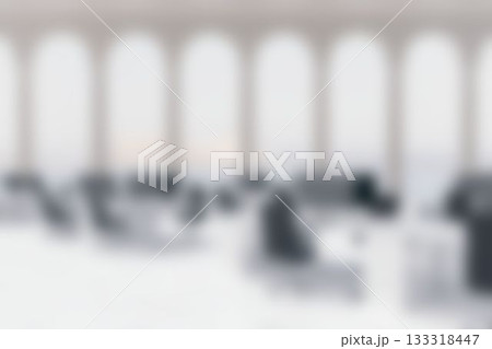 Defocused image of desk and chairs 133318447