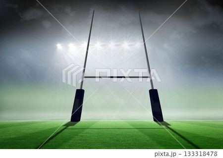 Rugby goal post is standing on striped grass pitch under misty stadium floodlights in flat design 133318478