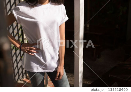 Flat design adult woman is standing in sunlit veranda, casting lattice shadows on tiled floor Flat design adult woman is standing in sunlit veranda, casting lattice shadows on tiled floor 133318490