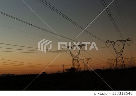 The evening electricity pylon silhouette The evening electricity pylon silhouette 133318549