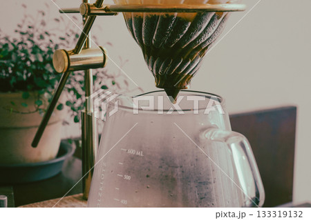 Coffee Dripping Through Paper Filter Coffee Dripping Through Paper Filter 133319132