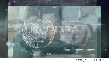 Holding smartphone man wearing sweater using digital display in office, showing 3D globe overlays Holding smartphone man wearing sweater using digital display in office, showing 3D globe overlays 133319646
