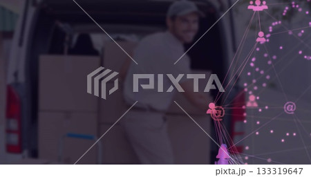 Unloading uniformed delivery worker lifting cardboard box at van rear, with digital network overlay Unloading uniformed delivery worker lifting cardboard box at van rear, with digital network overlay 133319647