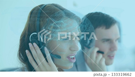 Call center agent wearing shirt and headset handling customer call in office with globe overlay 133319662