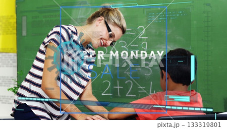Leaning teacher pointing at green chalkboard equations while assisting boy at desk in classroom Leaning teacher pointing at green chalkboard equations while assisting boy at desk in classroom 133319801