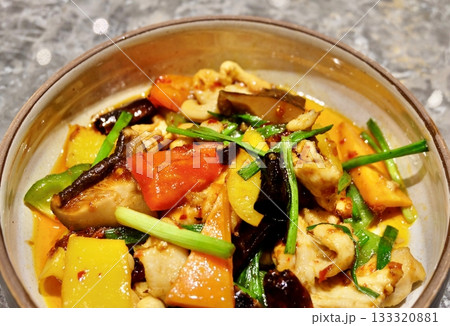 Spoon Lifting Mushroom from Spicy Chicken Stir Fry and Cashews 133320881