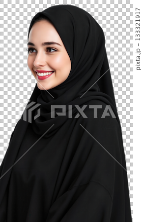 Woman Hijab Smiling. A young woman wearing a black hijab and abaya smiles warmly while looking off to her right 133321917