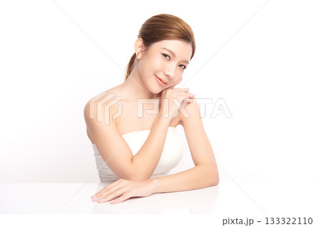 A beautiful young Asian woman with clean, fresh skin against a white background. Skincare, facial treatment, cosmetology, beauty, and spa. An elegant portrait of an Asian woman. A beautiful young Asian woman with clean, fresh skin against a white background. Skincare, facial treatment, cosmetology, beauty, and spa. An elegant portrait of an Asian woman. 133322110
