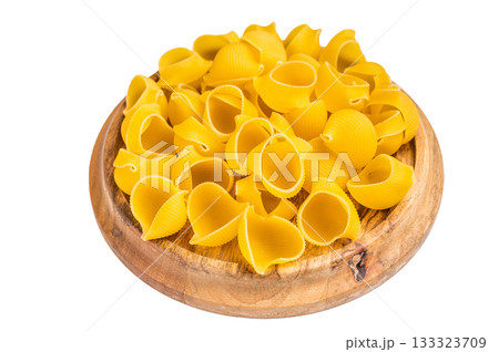 Jambo Pipe rigate raw pasta isolated on white background. top view Jambo Pipe rigate raw pasta isolated on white background. top view 133323709