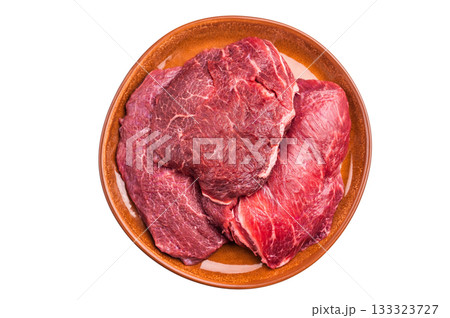 Traditional German beef cheeks, raw meat in plate Isolated on white background. top view 133323727