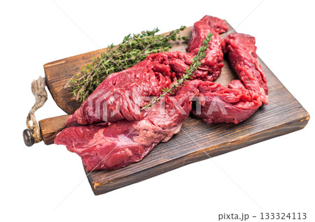 Uncooked Beef Skirt Steak, also name Machete steak, raw meat on cutting board isolated on white background 133324113