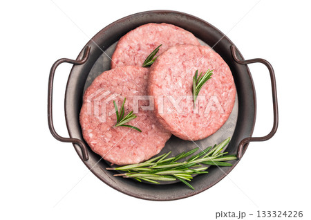 Freshly formed raw meat patty with herbs for burgers, perfect for grilling or frying to satisfy your cravings. isolated on white background. top view Freshly formed raw meat patty with herbs for burgers, perfect for grilling or frying to satisfy your cravings. isolated on white background. top view 133324226