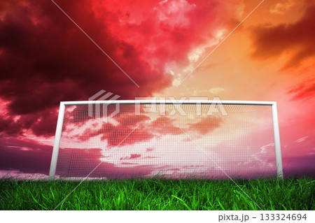 Football goal under red cloudy sky Football goal under red cloudy sky 133324694