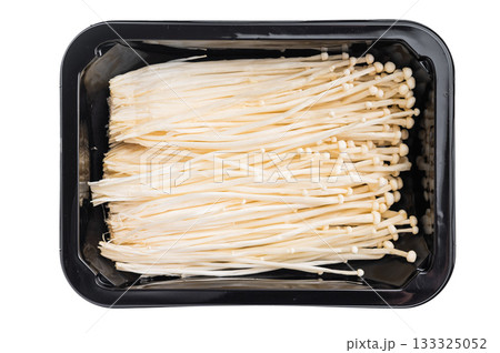 Fresh Enoki mushrooms (Flammulina filiformis) in a black plastic container, ready for cooking Asian cuisine like hot pot, soups, or stir-fries. Fresh Enoki mushrooms (Flammulina filiformis) in a black plastic container, ready for cooking Asian cuisine like hot pot, soups, or stir-fries. 133325052