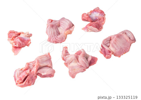 Raw chicken gizzards on a pristine white background, highlighting their texture and natural color. Raw chicken gizzards on a pristine white background, highlighting their texture and natural color. 133325119