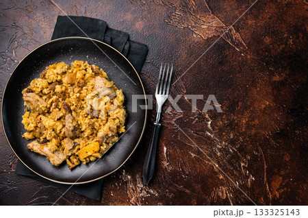 Traditional Central Asian dish Chon Kemin Valley. brown background. top view Traditional Central Asian dish Chon Kemin Valley. brown background. top view 133325143