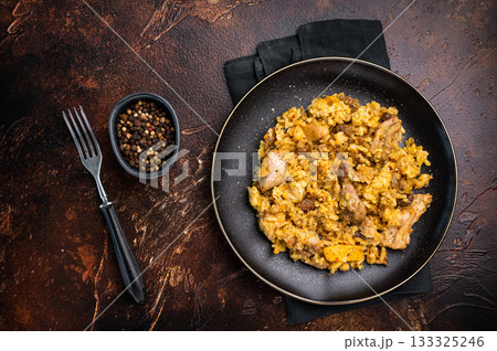Traditional Central Asian dish Chon Kemin Valley. brown background. top view 133325246