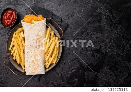 Seafood Wrap, Doner kebab with shrimps, prawns and salad. black background. top view Seafood Wrap, Doner kebab with shrimps, prawns and salad. black background. top view 133325318