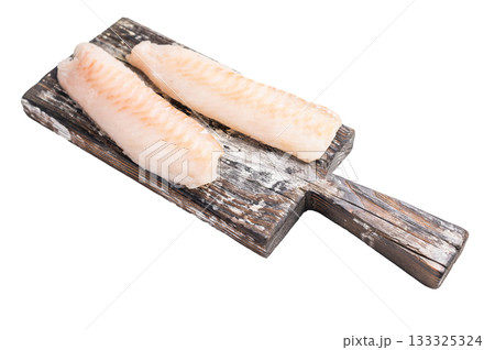 Raw cod Loin, white fish fillets without skin on wooden board isolated on white background Raw cod Loin, white fish fillets without skin on wooden board isolated on white background 133325324