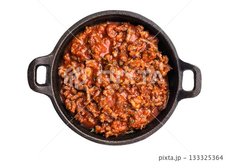 Bolognese sauce with minced beef and herbs in a skillet isolated on white background 133325364