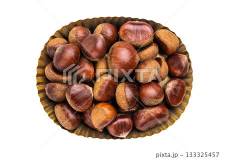 Heap of fresh chestnuts in kitchen tray ready for roasting isolated on white background Heap of fresh chestnuts in kitchen tray ready for roasting isolated on white background 133325457