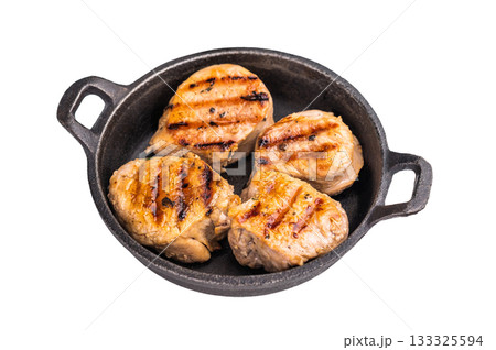 Juicy grilled pork medallions steaks, perfectly seared tenderloin meat for a flavorful bite, ideal for any gourmet meal. isolated on white background. top view 133325594