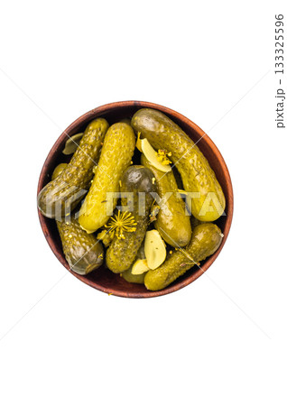 Pickled Gherkins beautifully arranged and ready to elevate your culinary creations with their bold taste. isolated on white background. top view 133325596