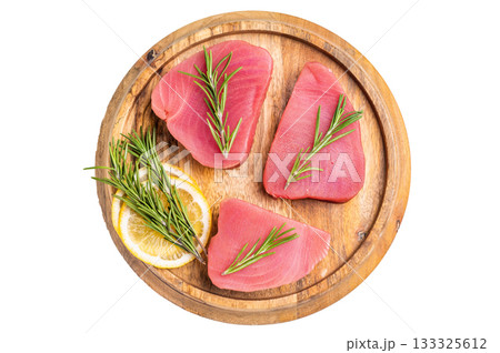 High quality raw tuna steak loin, perfect for a refreshing poke bowl or a delicious seared dish that impresses every time. isolated on white background. top view High quality raw tuna steak loin, perfect for a refreshing poke bowl or a delicious seared dish that impresses every time. isolated on white background. top view 133325612