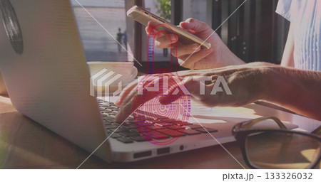 Typing hands on silver laptop at cafe table, with gold smartphone, coffee cup, red fingerprint Typing hands on silver laptop at cafe table, with gold smartphone, coffee cup, red fingerprint 133326032