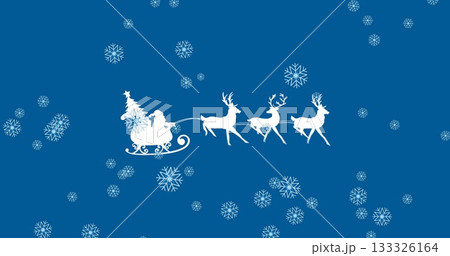 Gliding Santa Claus steering sleigh across snowy sky, with reindeer, Christmas tree and gift sacks 133326164