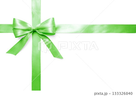Green satin bow and ribbon isolated on white background. Perfect mockup for Christmas, eco and spring celebration designs. 133326840
