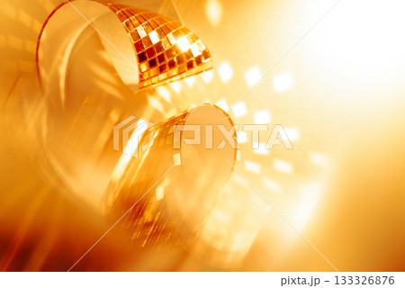 Abstract sparkling golden background for promo and holidays. Festive luxury banner background with copy space for sale and events. Abstract sparkling golden background for promo and holidays. Festive luxury banner background with copy space for sale and events. 133326876