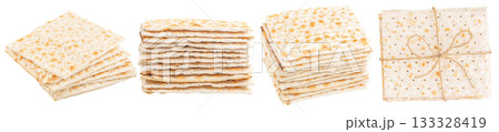 Traditional Israeli matzah bread stacked on white background, unleavened flatbread tied with string, symbol of Jewish culture and Passover holiday, copy space for text Traditional Israeli matzah bread stacked on white background, unleavened flatbread tied with string, symbol of Jewish culture and Passover holiday, copy space for text 133328419